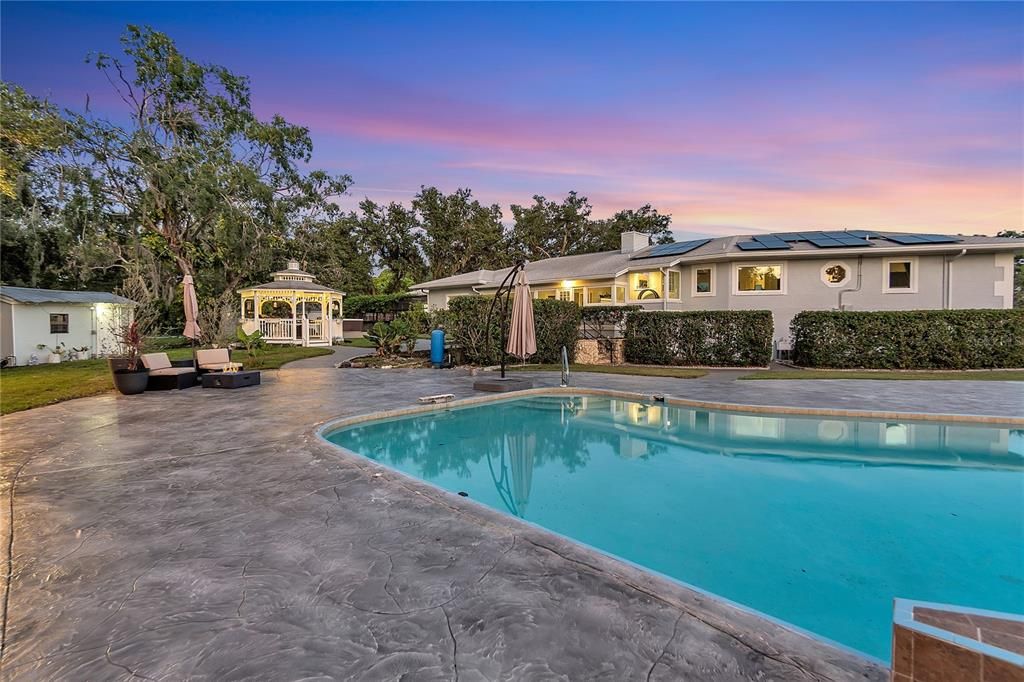 Exterior, Pool, Solar Panels