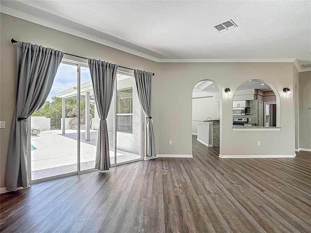 Empty room, Interior, Kitchen, Stainless Steel Appliances, Wood Texture Flooring
