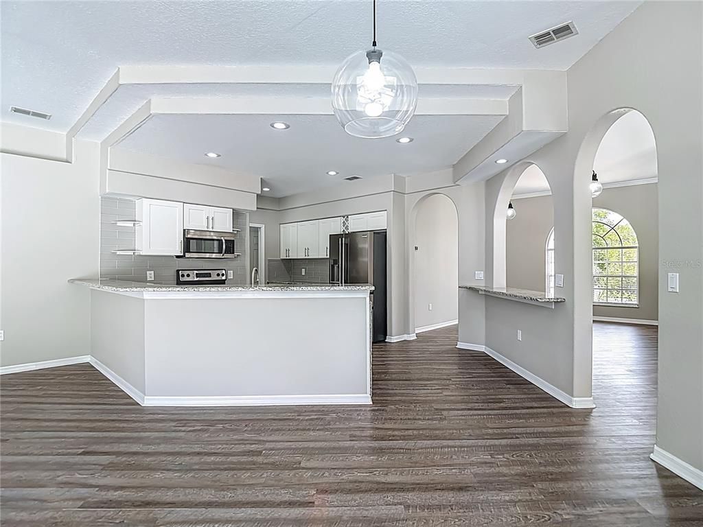 Interior, Kitchen, Pendant Lights, Recessed Lighting, Stainless Steel Appliances, Wood Texture Flooring