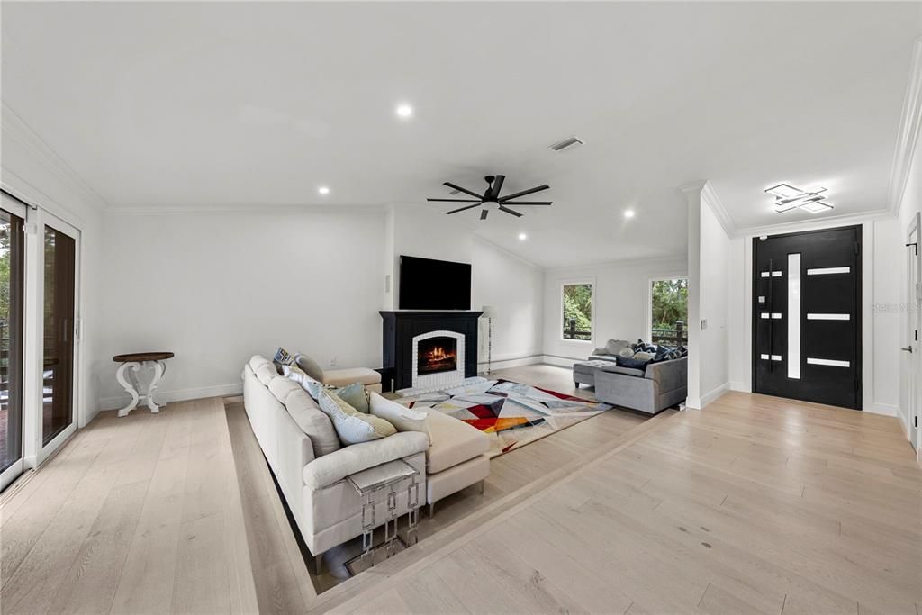 Fireplace, Interior, Living room, Recessed Lighting, Wood Texture Flooring