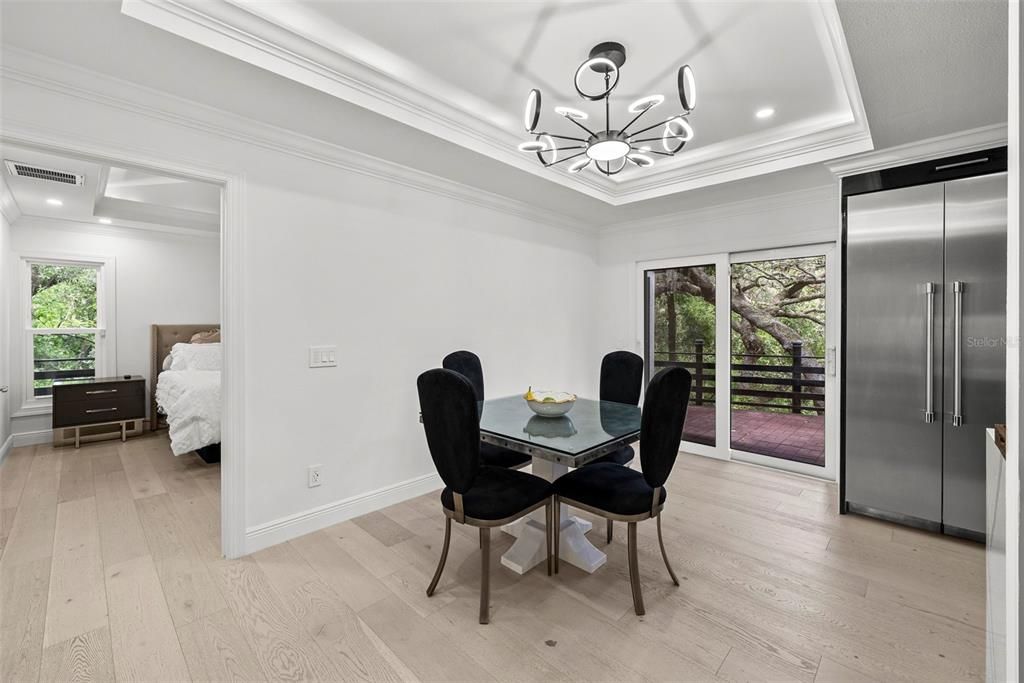Bedroom, Chandelier, Dining room, Interior, Pendant Lights, Recessed Lighting, Stainless Steel Appliances, Wood Texture Flooring