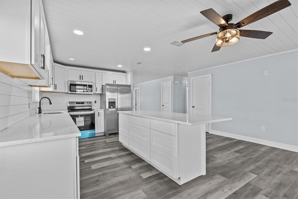 Interior, Kitchen, Recessed Lighting, Stainless Steel Appliances, Wood Texture Flooring