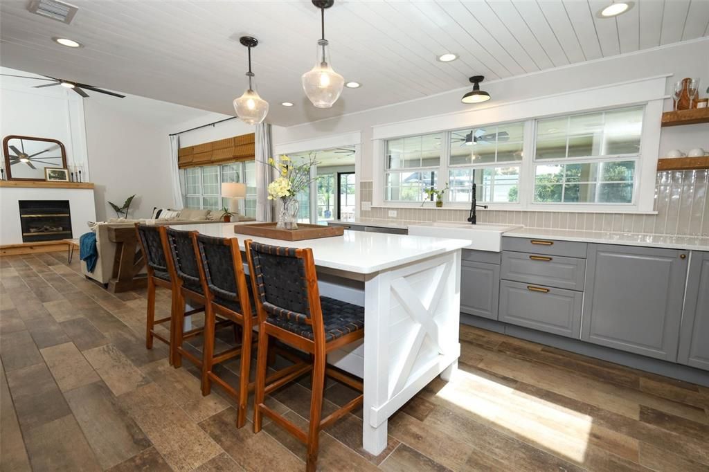 Fireplace, Interior, Kitchen, Pendant Lights, Recessed Lighting, Wood Texture Flooring