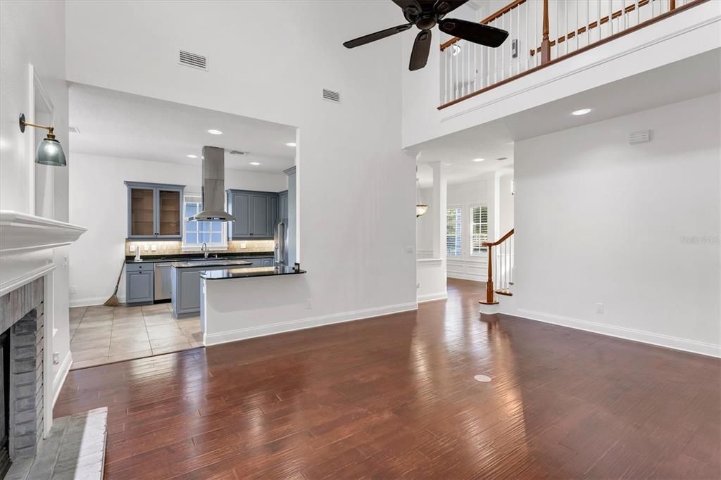 Fireplace, Interior, Kitchen, Recessed Lighting, Wood Texture Flooring