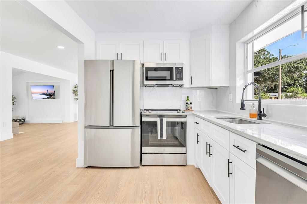 Interior, Kitchen, Recessed Lighting, Stainless Steel Appliances, Wood Texture Flooring