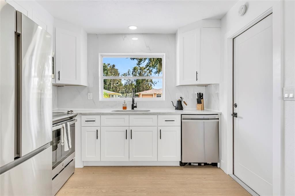 Interior, Kitchen, Recessed Lighting, Stainless Steel Appliances, Wood Texture Flooring