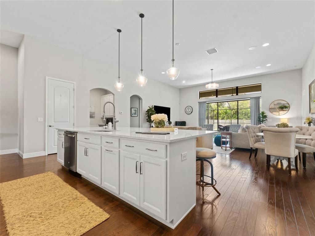 Dining room, Interior, Kitchen, Living room, Pendant Lights, Recessed Lighting, Stainless Steel Appliances, Wood Texture Flooring