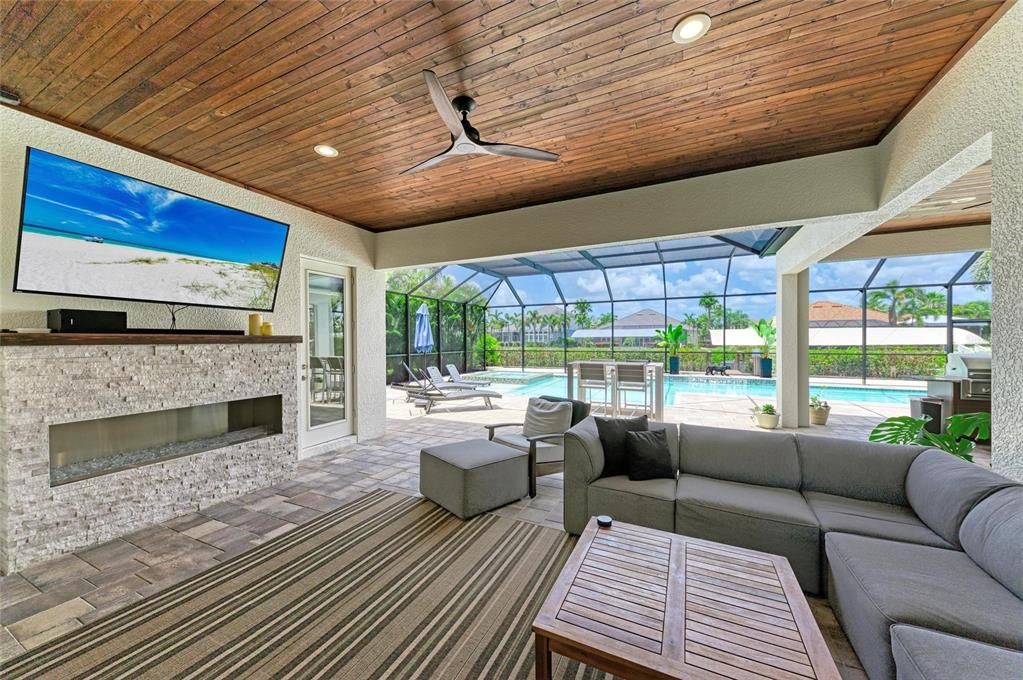 Fireplace, Glass Ceilings, Interior, Living room, Pool, Recessed Lighting, Sun Room, Wooden Ceilings
