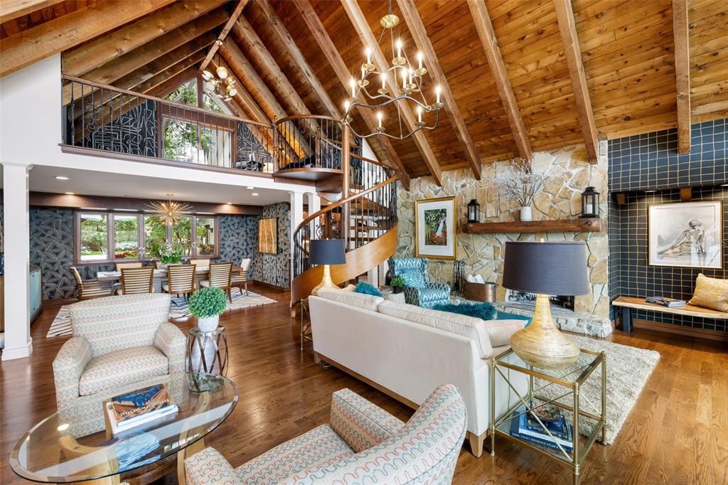 Chandelier, Dining room, Fireplace, Interior, Living room, Recessed Lighting, Stone Walls, Wooden Beams, Wooden Ceilings, Wood Texture Flooring