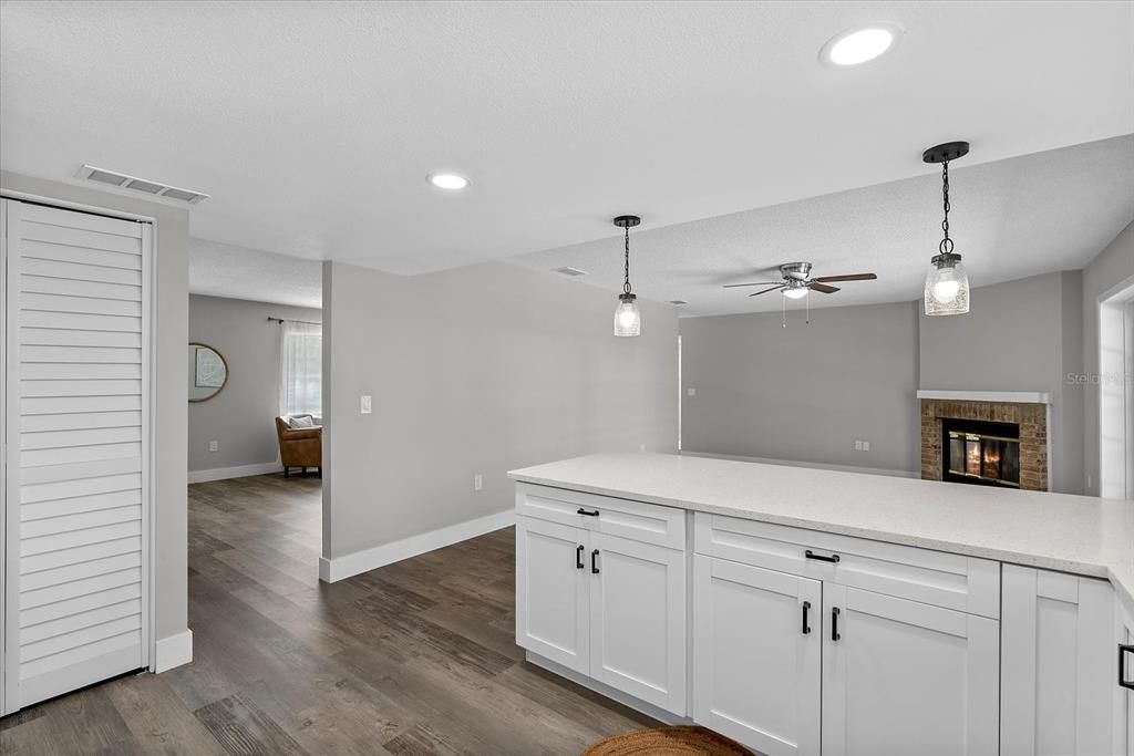 Fireplace, Interior, Pendant Lights, Recessed Lighting, Wood Texture Flooring