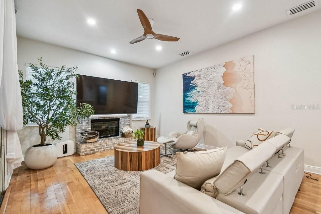 Fireplace, Interior, Living room, Recessed Lighting, Wood Texture Flooring