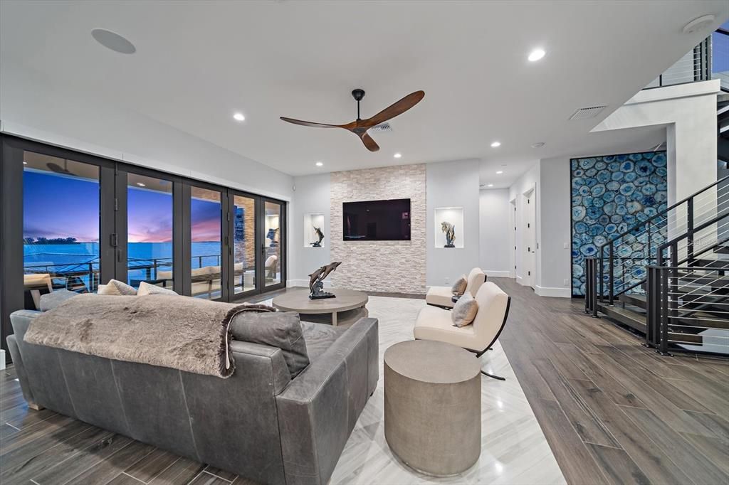 Interior, Living room, Recessed Lighting, Stone Walls, Water, Wood Texture Flooring