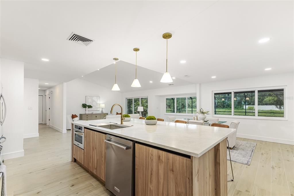 Dining room, Interior, Kitchen, Pendant Lights, Recessed Lighting, Stainless Steel Appliances, Wood Texture Flooring