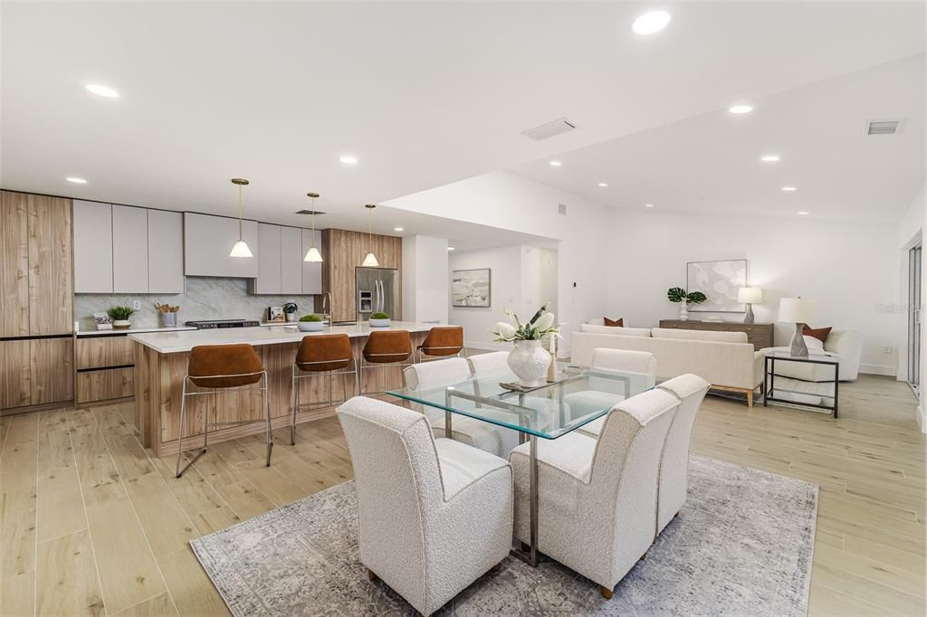 Dining room, Interior, Kitchen, Living room, Pendant Lights, Recessed Lighting, Stainless Steel Appliances, Wood Texture Flooring