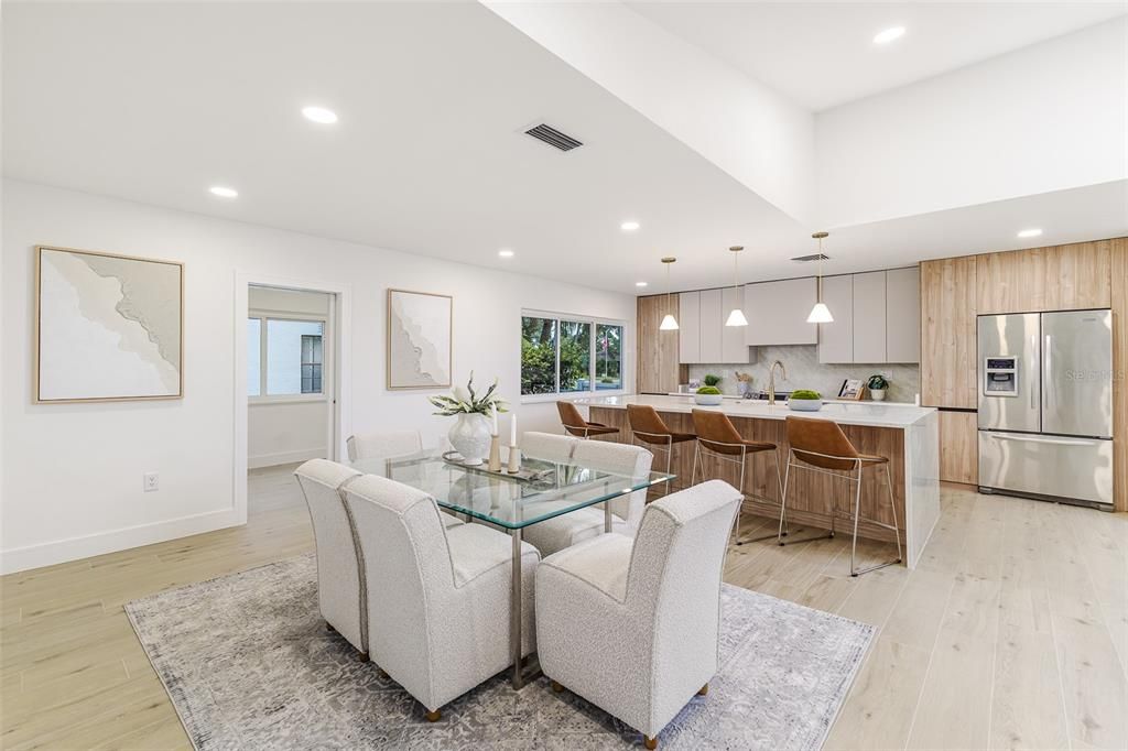Dining room, Interior, Kitchen, Pendant Lights, Recessed Lighting, Stainless Steel Appliances, Wood Texture Flooring