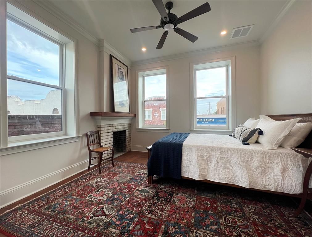 Bedroom, Fireplace, Interior, Recessed Lighting, Wood Texture Flooring