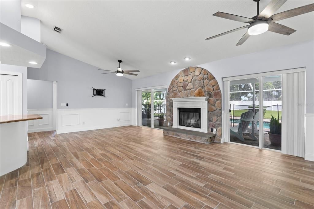 Empty room, Fireplace, Interior, Recessed Lighting, Wood Texture Flooring