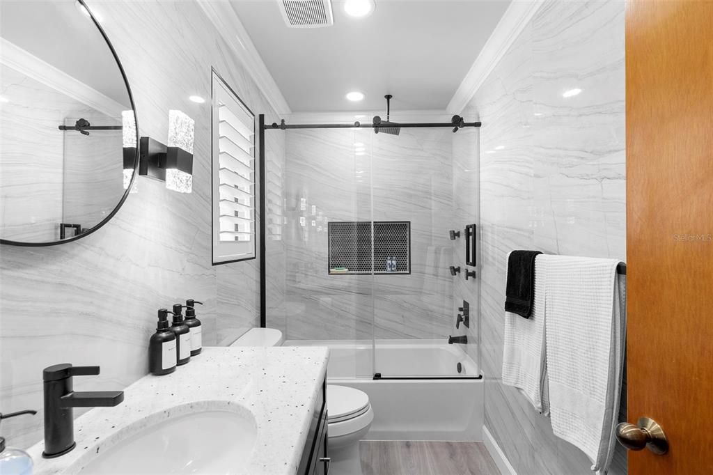 Bathroom, Glass Shower, Interior, Marble Walls, Recessed Lighting, Wood Texture Flooring