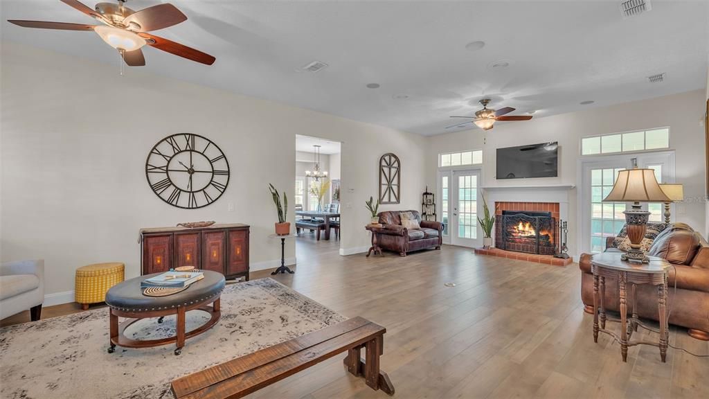 Dining room, Fireplace, Interior, Living room, Pendant Lights, Wood Texture Flooring