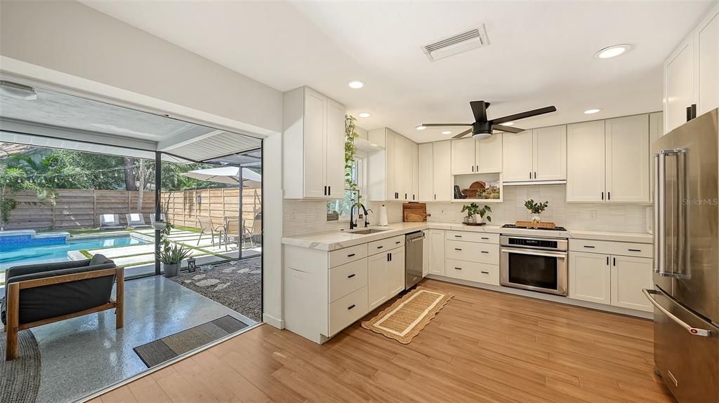 Interior, Kitchen, Recessed Lighting, Stainless Steel Appliances, Wood Texture Flooring
