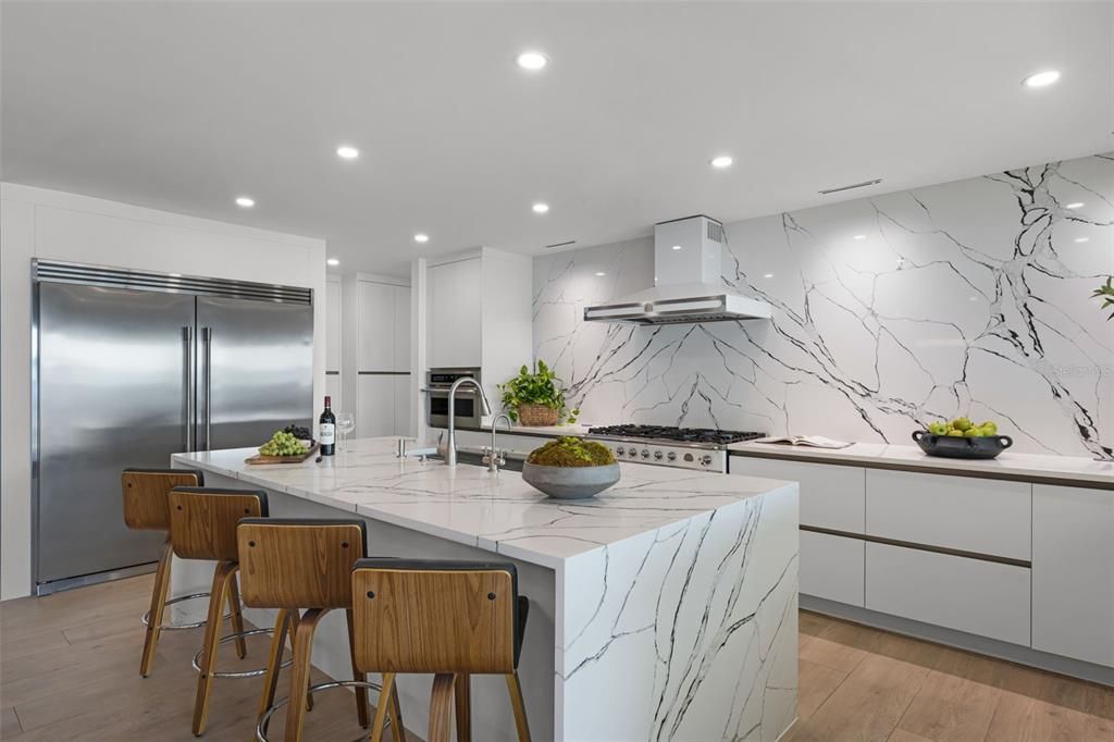 Interior, Kitchen, Marble Walls, Recessed Lighting, Stainless Steel Appliances, Wood Texture Flooring