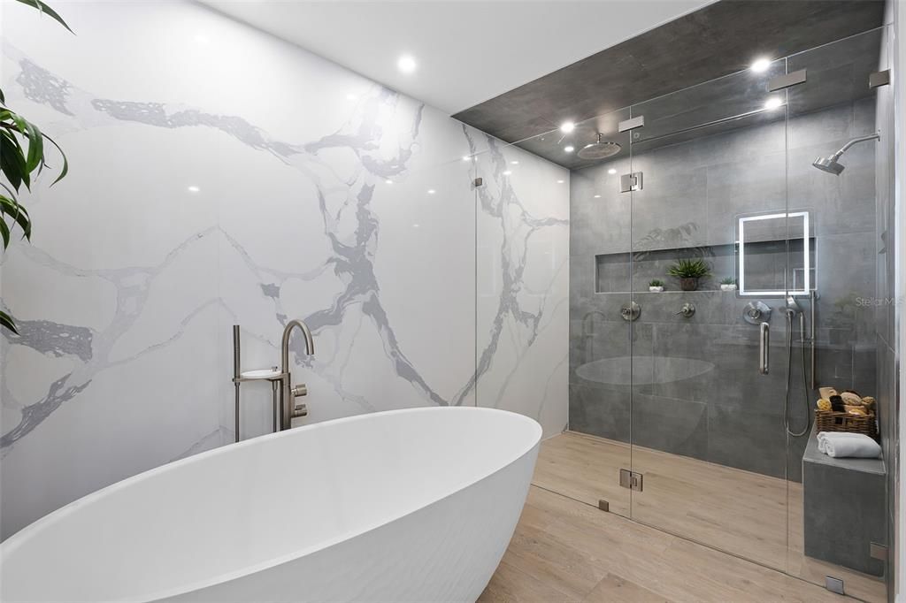 Bathroom, Free Standing Baths, Glass Shower, Interior, Marble Walls, Recessed Lighting