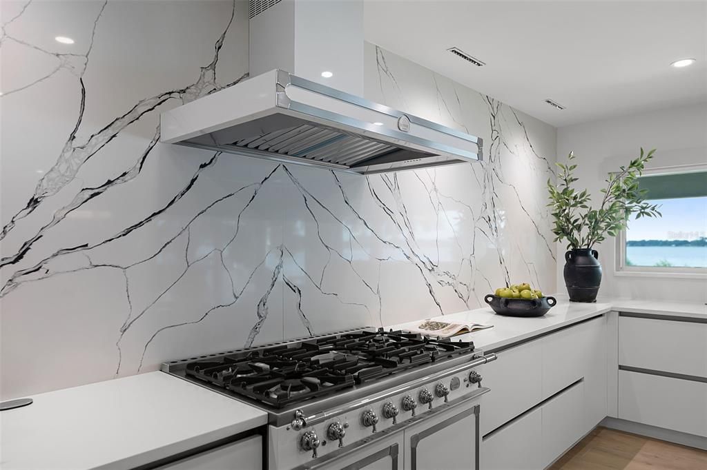 Interior, Kitchen, Marble Walls, Recessed Lighting, Stainless Steel Appliances, Water, Wood Texture Flooring