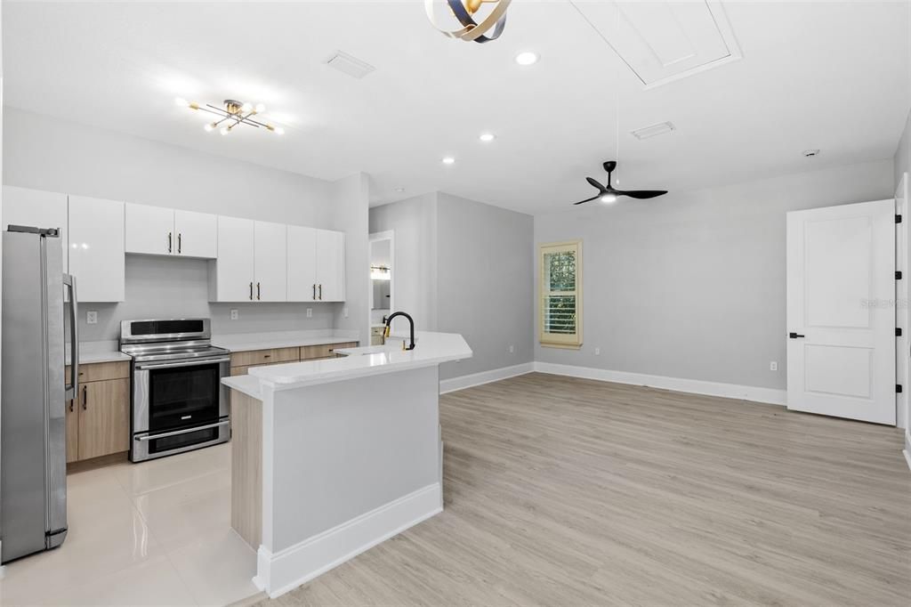 Interior, Kitchen, Recessed Lighting, Stainless Steel Appliances, Wood Texture Flooring