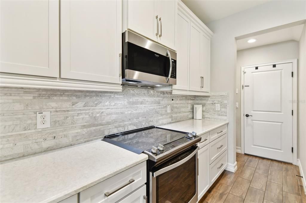 Interior, Kitchen, Recessed Lighting, Stainless Steel Appliances, Wood Texture Flooring