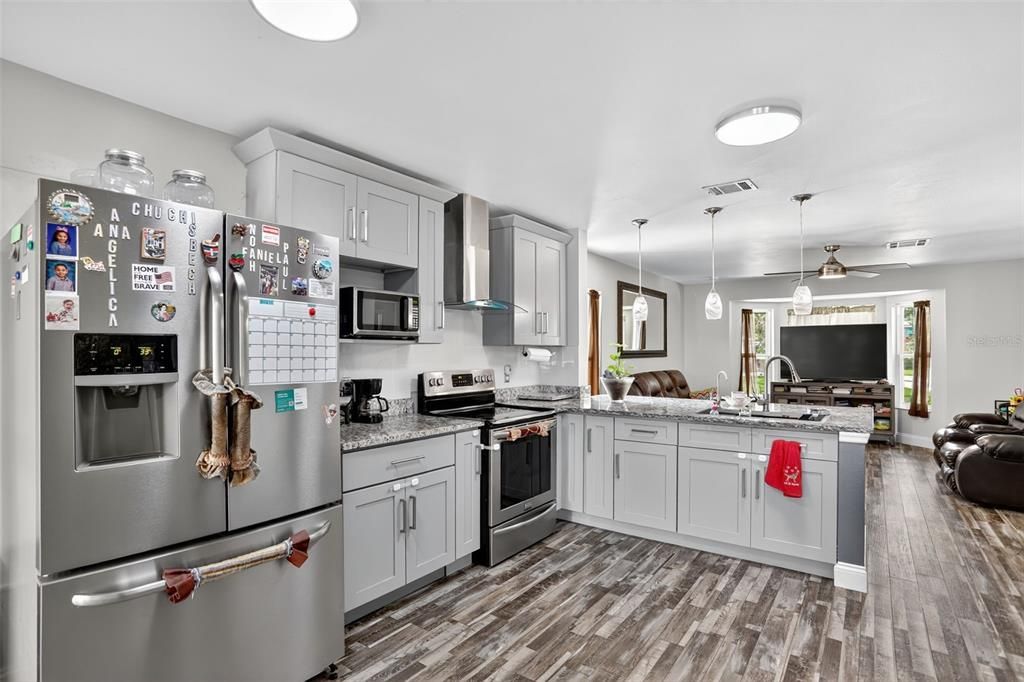 Interior, Kitchen, Pendant Lights, Stainless Steel Appliances, Wood Texture Flooring