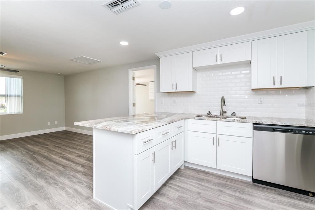 Interior, Kitchen, Recessed Lighting, Stainless Steel Appliances, Wood Texture Flooring