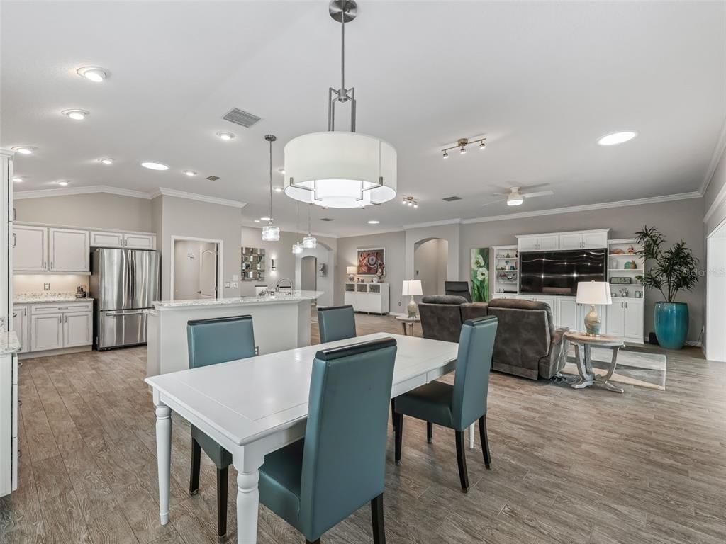 Dining room, Interior, Kitchen, Living room, Pendant Lights, Recessed Lighting, Stainless Steel Appliances, Wood Texture Flooring