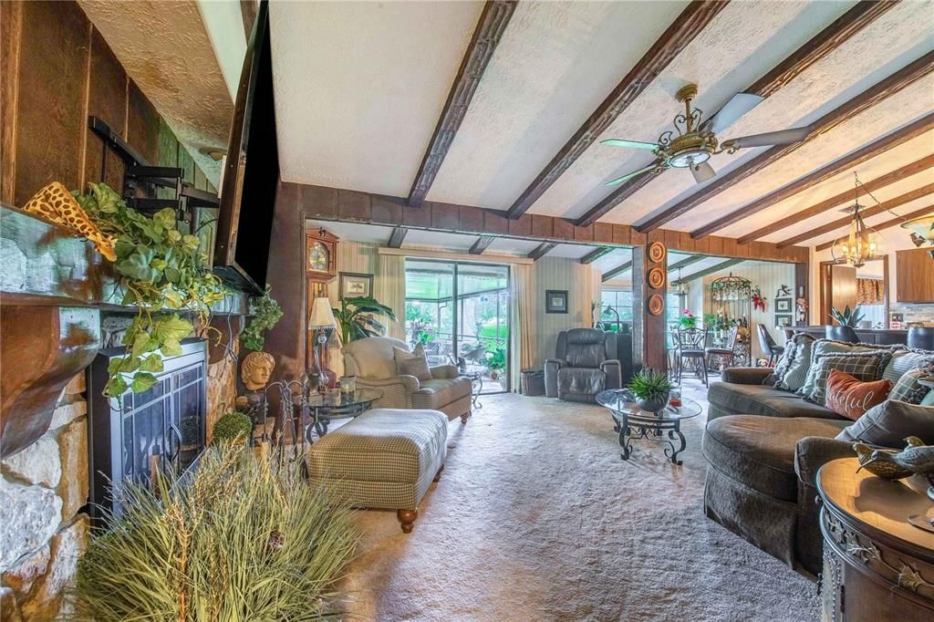 Chandelier, Dining room, Fireplace, Interior, Living room, Wooden Beams