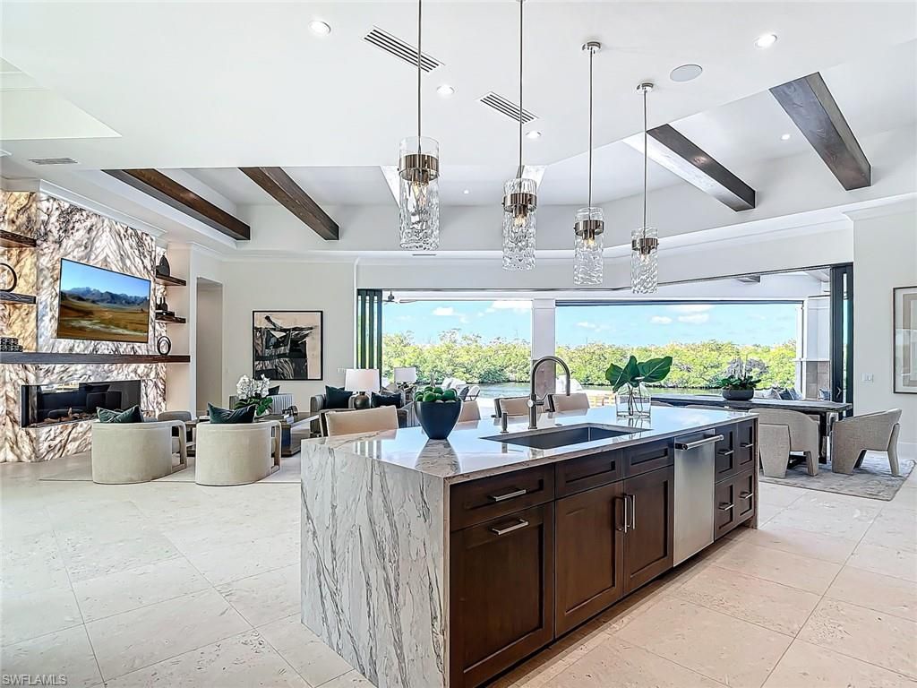 Fireplace, Interior, Kitchen, Living room, Pendant Lights, Recessed Lighting, Stainless Steel Appliances, Wooden Beams