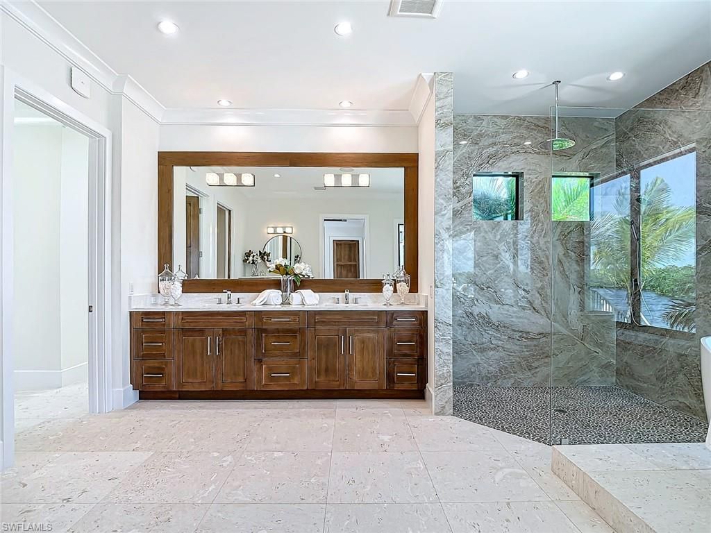 Bathroom, Dual Sink Vanities, Glass Shower, Interior, Marble Walls, Recessed Lighting