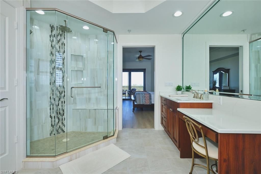 Bathroom, Dual Sink Vanities, Glass Shower, Interior, Recessed Lighting, Wood Texture Flooring