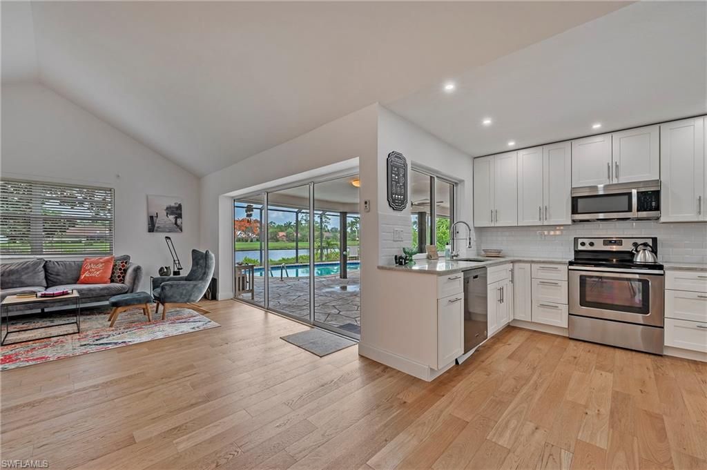 Interior, Kitchen, Living room, Recessed Lighting, Stainless Steel Appliances, Wood Texture Flooring