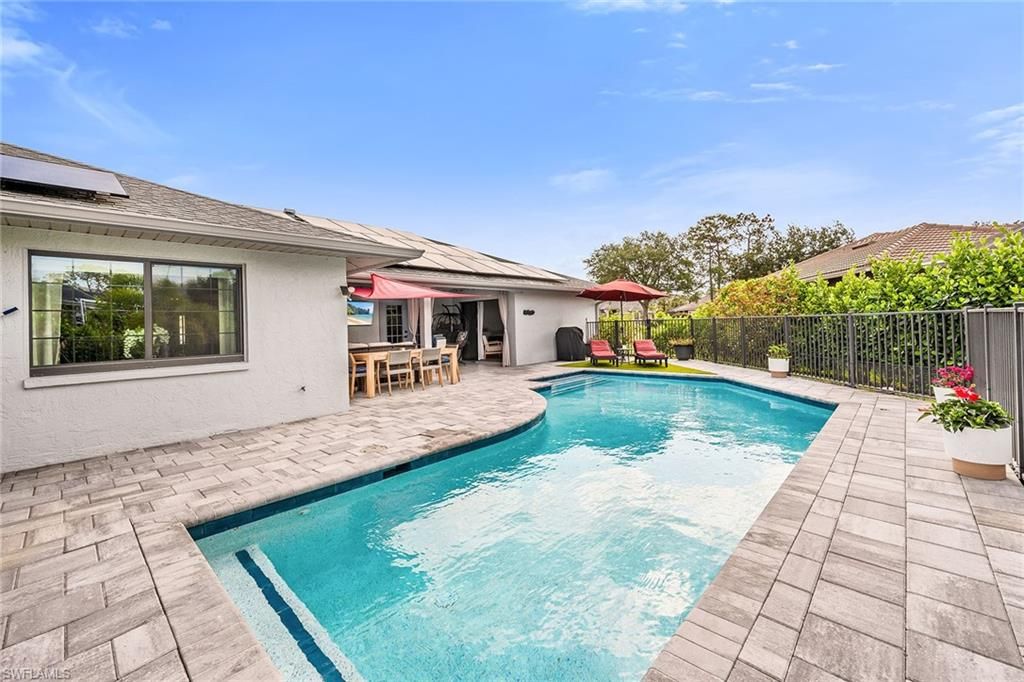 Exterior, Pool, Solar Panels
