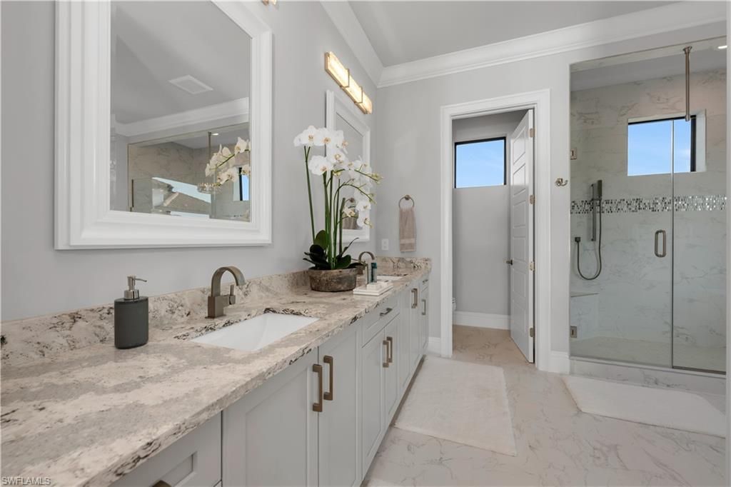 Bathroom, Dual Sink Vanities, Glass Shower, Interior, Marble, Marble Walls