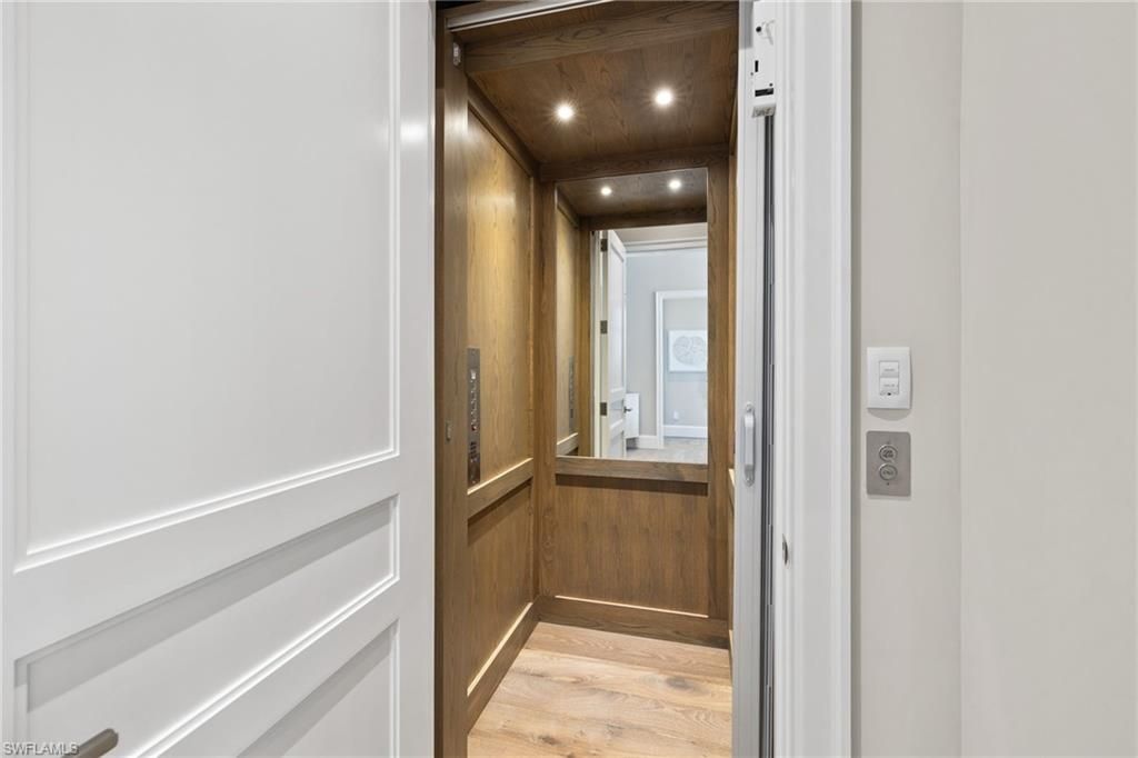 Elevator, Interior, Recessed Lighting, Wooden Ceilings, Wood Texture Flooring, Wooden Walls