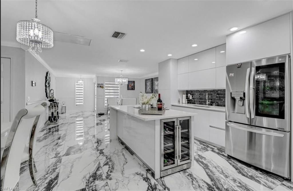 Chandelier, Interior, Kitchen, Marble, Pendant Lights, Recessed Lighting, Stainless Steel Appliances