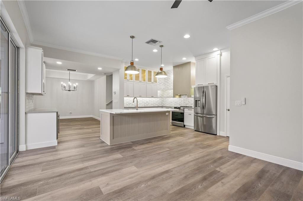 Interior, Kitchen, Pendant Lights, Recessed Lighting, Stainless Steel Appliances, Wood Texture Flooring