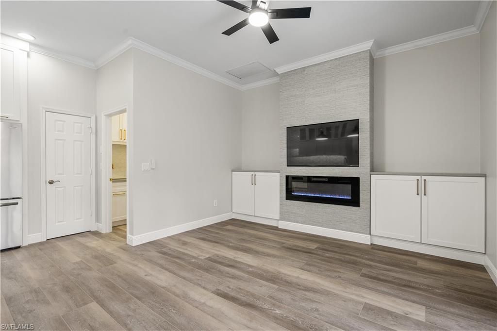 Empty room, Fireplace, Interior, Recessed Lighting, Wood Texture Flooring
