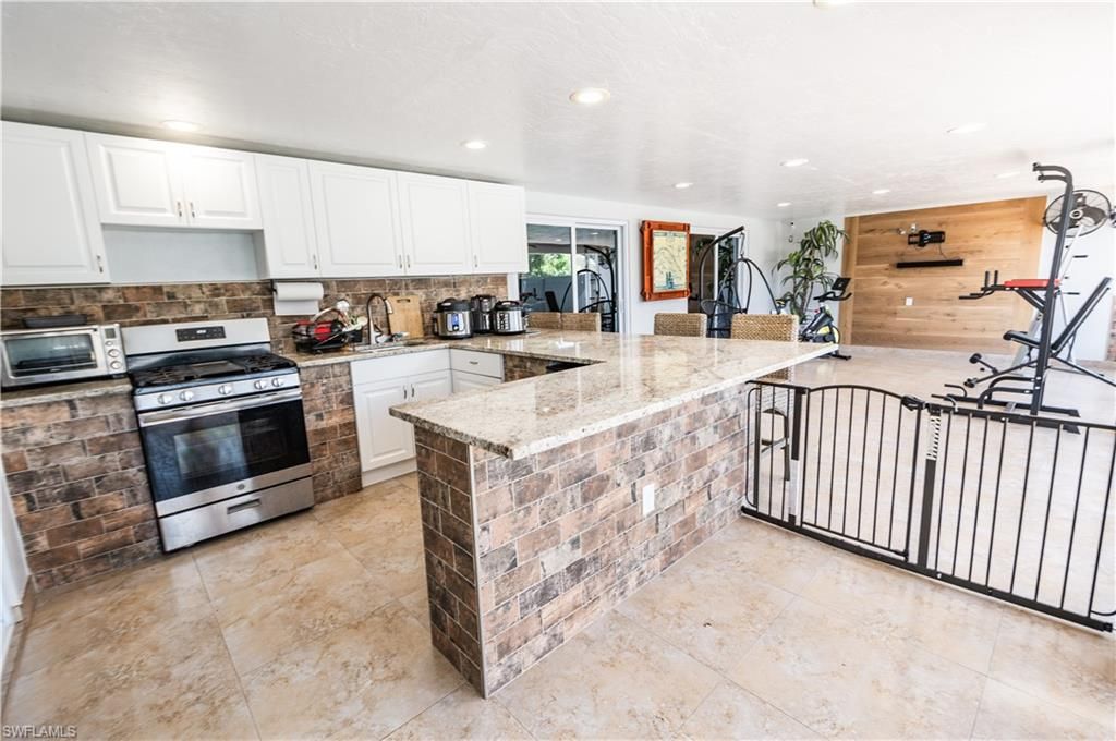 Interior, Kitchen, Recessed Lighting, Stainless Steel Appliances, Wooden Walls