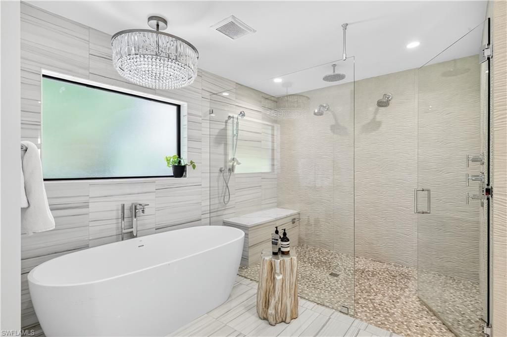 Bathroom, Chandelier, Free Standing Baths, Glass Shower, Interior, Recessed Lighting