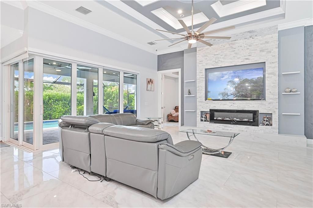Fireplace, Interior, Living room, Marble, Recessed Lighting, Stone Walls