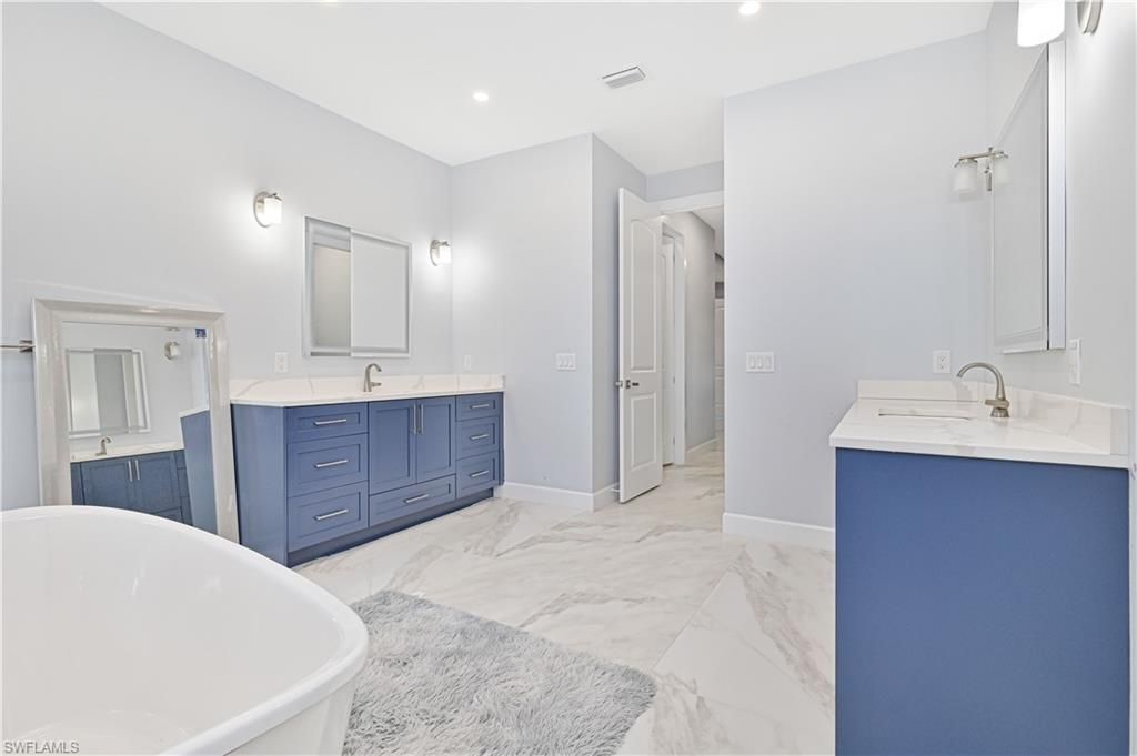 Bathroom, Dual Sink Vanities, Free Standing Baths, Interior, Marble, Recessed Lighting