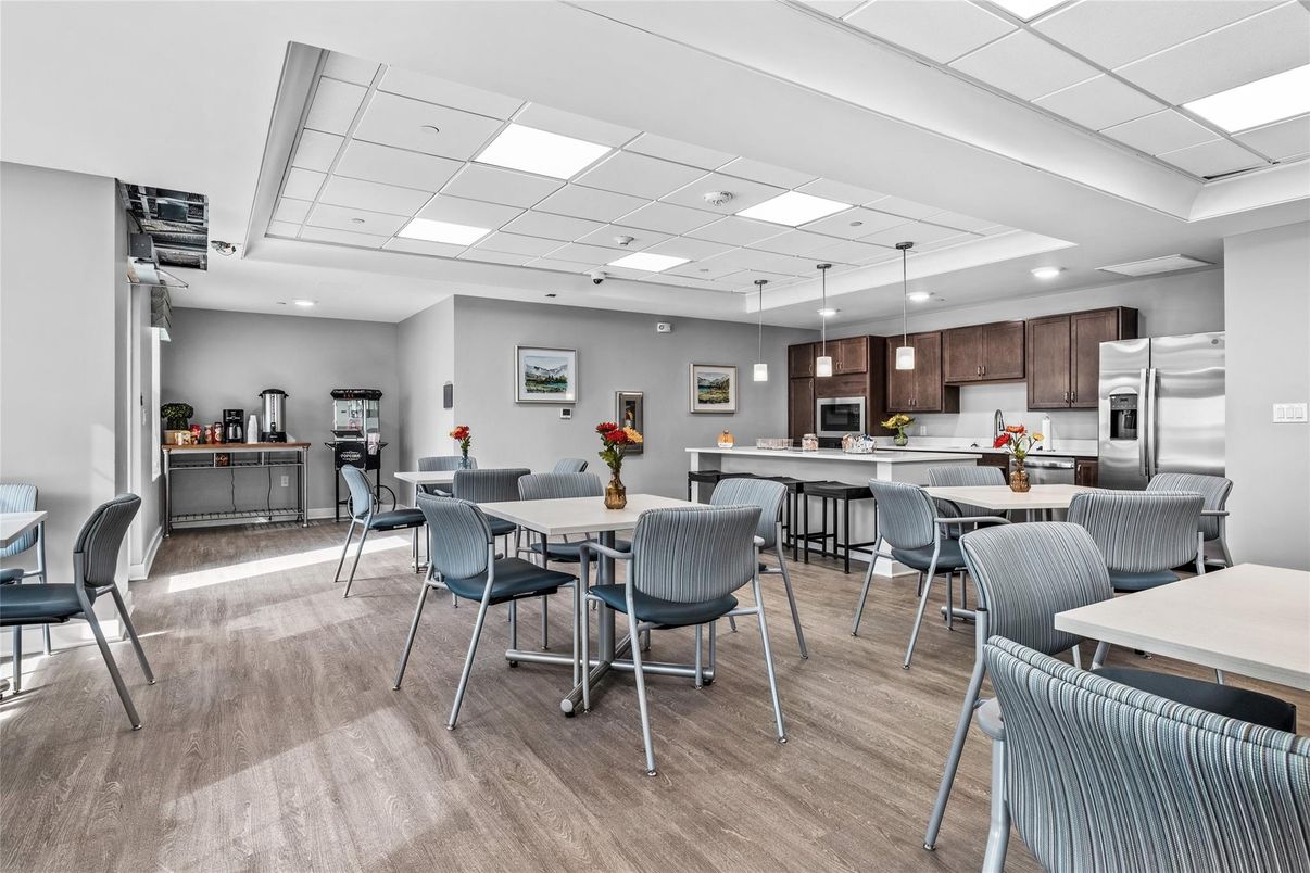 Dining room, Interior, Kitchen, Pendant Lights, Recessed Lighting, Stainless Steel Appliances, Wood Texture Flooring