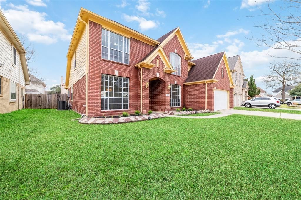 Attached, Backyard, Exterior, Facade, Brick Facade, Brick Traditional