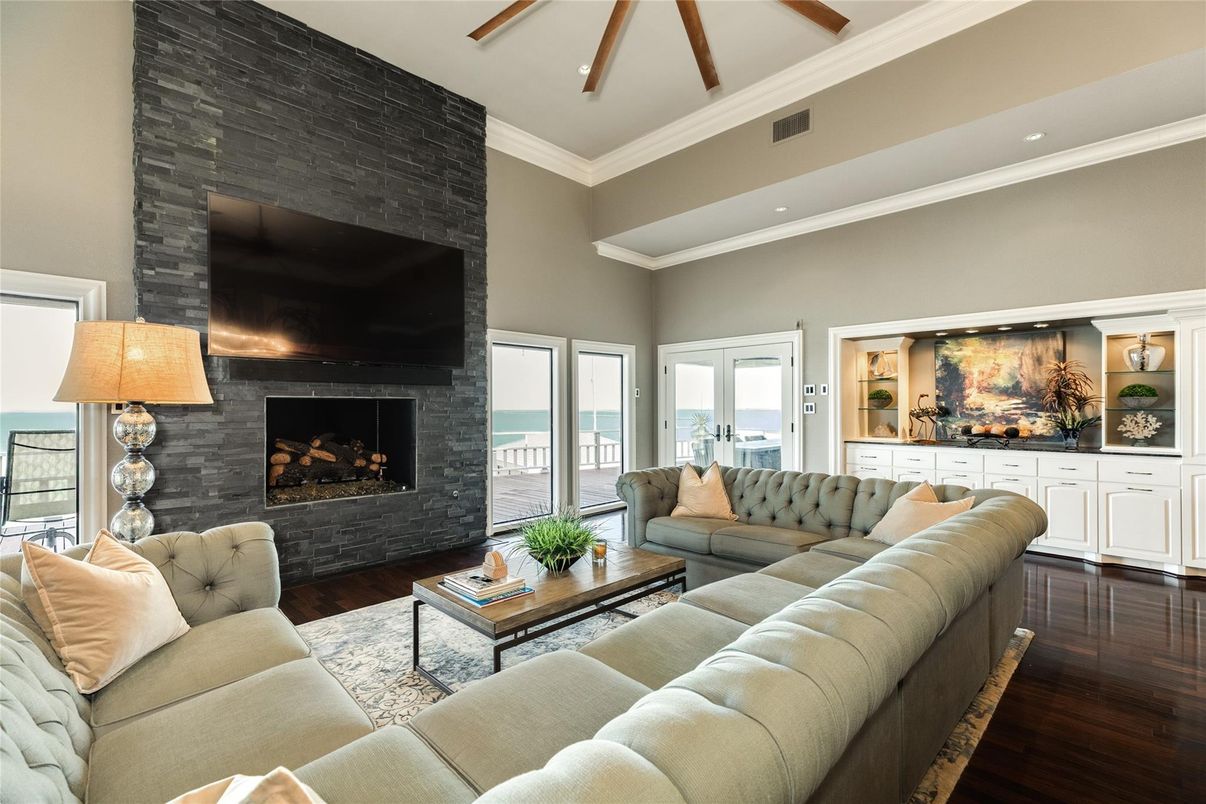 Fireplace, Interior, Living room, Recessed Lighting, Water, Wood Texture Flooring